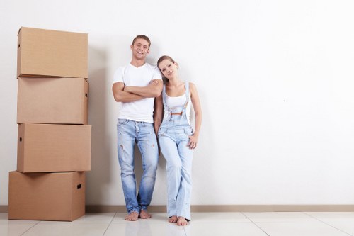 Office removals team preparing desks and boxes for a London business move