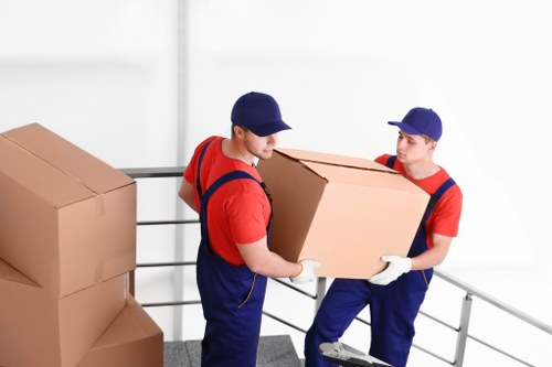 Man with van vehicle loading furniture for a London move