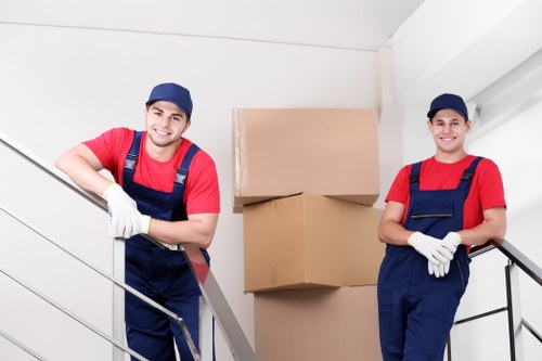 House movers loading furniture for a London home removal
