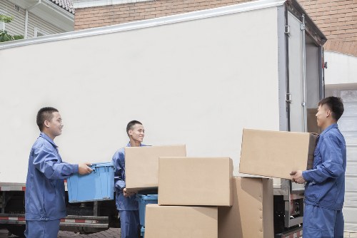Packed boxes and furniture ready for a London relocation