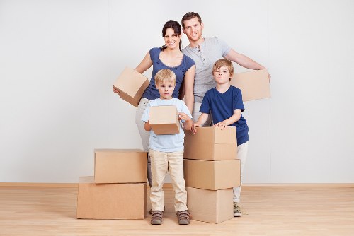 Packed boxes and furniture ready for a London relocation