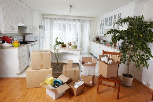 Packed boxes and furniture ready for a London man and van move