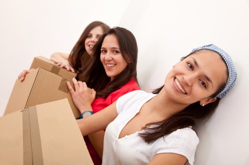 Prepared moving boxes and household items in a London property