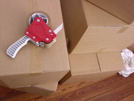 Office relocation equipment and boxes prepared for transport in London