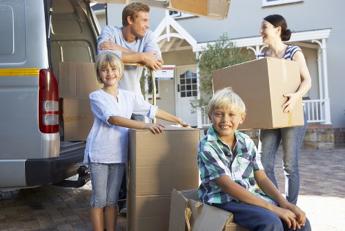 Commercial moving team relocating office furniture in London