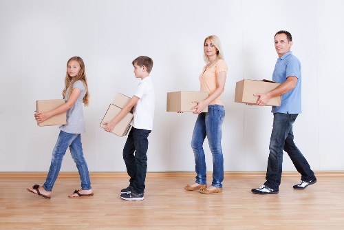 Unpacking boxes in a London home after moving day