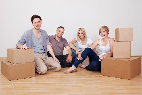 Packed moving boxes and household items ready for a London house removal