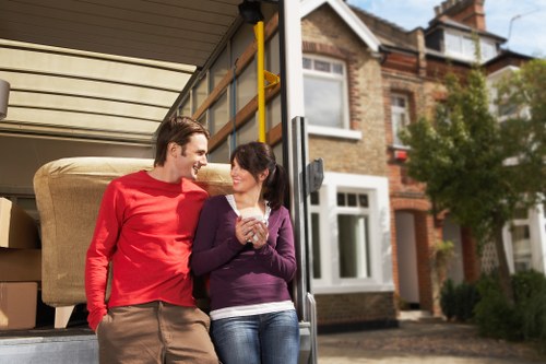 Careful handling of furniture during a flat move in London