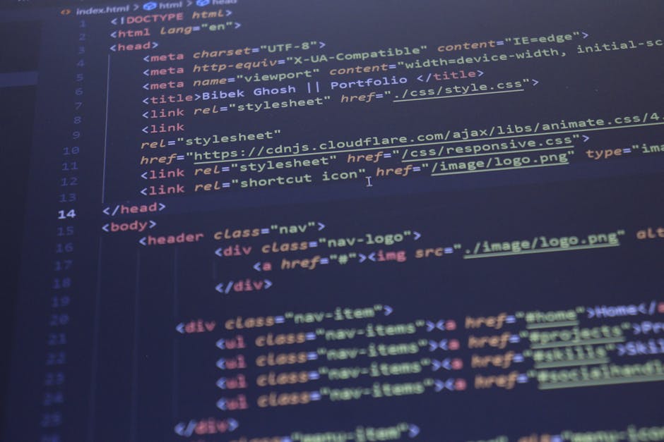 Close-up view of a computer screen displaying lines of code in a programming environment, with syntax highlighting in various colors such as green, red, blue, and purple. The code includes terms like